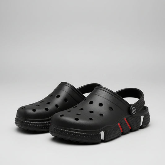Two people wearing black slip-on clogs with ventilation holes, standing on an urban street.