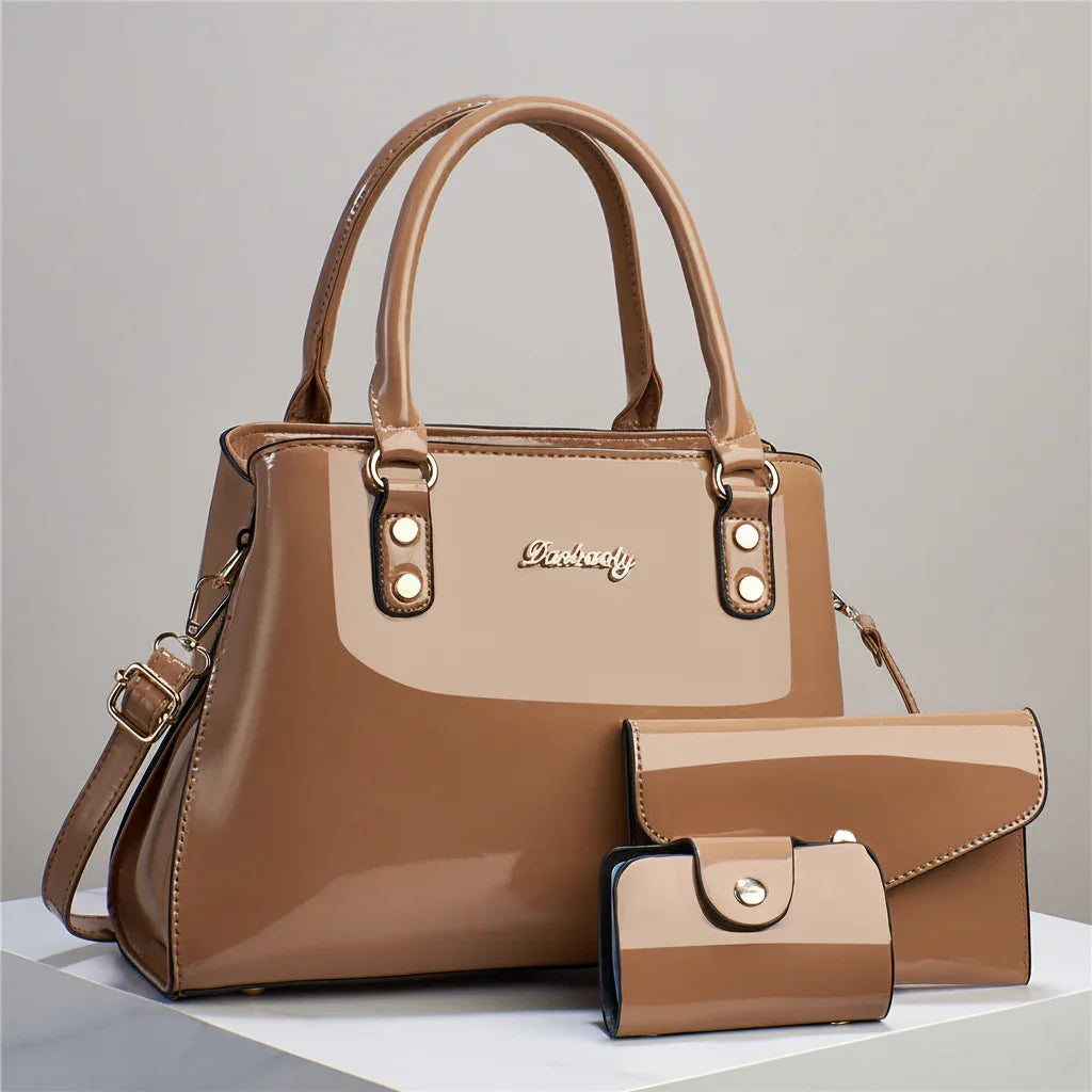Elegant chocolate brown women's shoulder bag set with matching wallet and clutch on display.